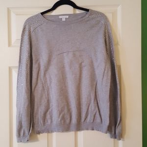 Light weight Gray sweater with jeweled sleeves.